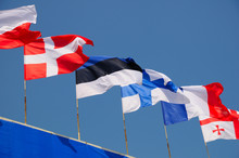 Various National Flags Flapping In The Wind