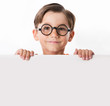© pressmaster - Face of youthful boy in glasses
