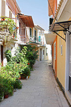 A Narrow Street In The Island Town Of Lefkada, Greece