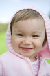 © Adam Borkowski - portrait of happy baby girl in park