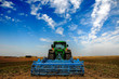 © DeshaCAM - The Tractor - modern farm equipment in field