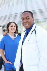 Wall Mural - A happy and successful medical team outside hospital