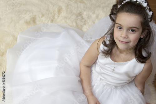 Fotografie, Obraz Portrait of a little girl in communion dress and veil.