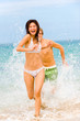 © EastWest Imaging - A young couple having fun on a tropical beach