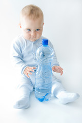 Poster - baby boy and bottle of mineral water, on white