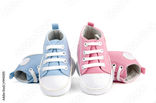 pink and blue baby shoes