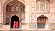 Two Women Walking In The Amber Fort, Jaipur