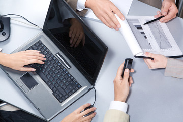 Poster - Close-up of businesspeople hands over workplace