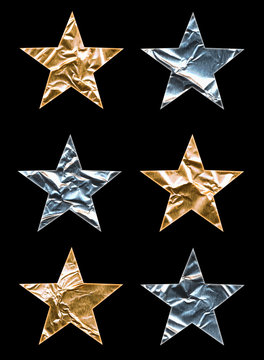 Fototapete - Six large gold and silver stars with a clipping path.