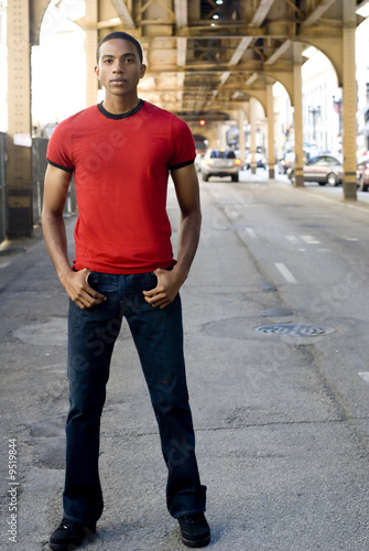 red t shirt and black jeans