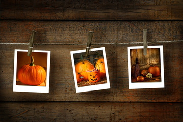 Halloween photos on distressed wood background