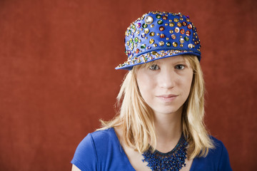 Wall Mural - Teenage girl wearing a hat with sequins