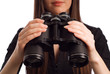© StockMasters - Business woman strategist with binoculars