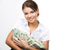 © pressmaster - Portrait of charming woman holding dollars