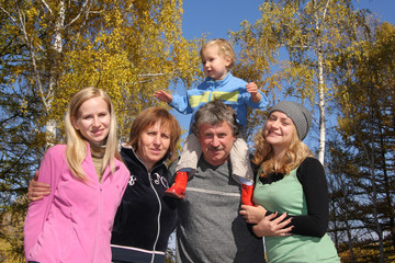 Sticker - Happy family in autumn park