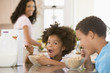 © Monkey Business - Children Eating Breakfast