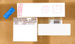 Airmail, postage and customs labels on a package from England.