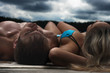 © Tsian - Young couple is relaxing after swiming