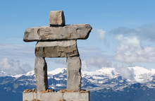 Rock Inukshuk With Mountains - Inuit Symbol - Olympic Symbol