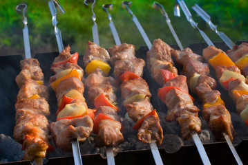 Wall Mural - kabobs grilled with vegetables on metal skewers