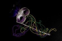 A Mardi Gras Or Constume Party Mask With Beads