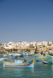 Fototapeta  - marsaxlokk malta fishing village luzzu classic fishing boats