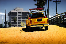 Bright Colorful Photo Of Life Guard Truck On The Beach