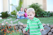 © Stephen Coburn - A happy family having fun outdoors in front of their home