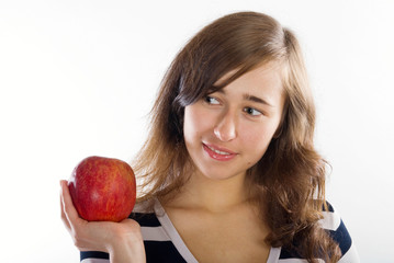 beautiful young woman with apple