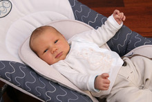 Newborn Baby In Bouncer Chair