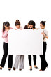 © eyedear - four girls lloking at a white sign