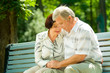 © vgstudio - Elderly couple listening music in headset or praying together