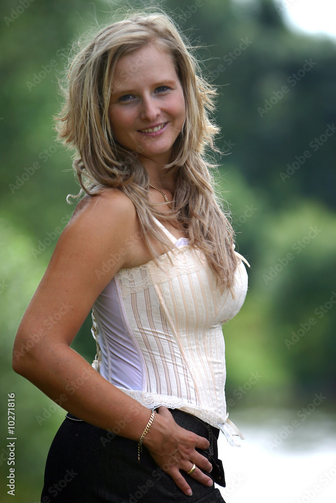 portrait-of-busty-blond-girl-stock-photo-adobe-stock