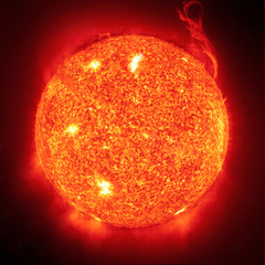 Wall Mural - the sun on a black background
