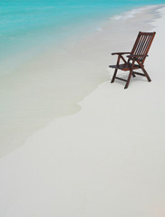 Wall Mural - chair on the beach with hat