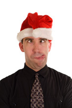 An Employee Making A Funny Face While Wearing A Xmas Hat