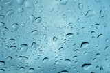 Fototapeta Natura - Rain drops on glass window.