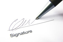 Detail View Of The Signature Box Of A Contract With A Pen.