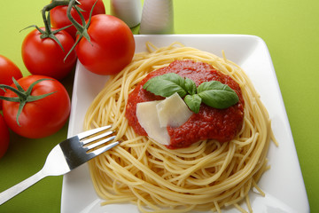 Sticker - Italian pasta with tomato sauce and parmesan and fork.