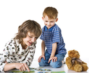 Wall Mural - Cheerful son plays with mother