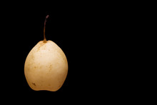 Yellow Pear On Black Background