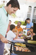 © Monkey Business - Family Enjoying A Barbeque