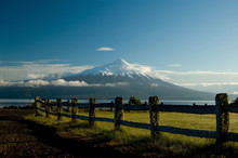 Snow Peeked Volcano From Fenced Field, Patagonia Chile