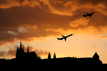 Wall Mural - planes departing Prague at sunset