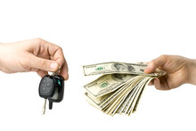 Hand With Money And Car Keys