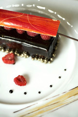 Dark chocolate tart with raspberry wafer