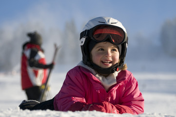 Little girl on ski