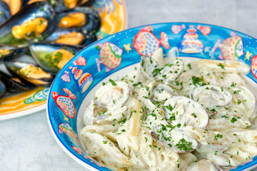 Penne in Barca (Penne with milk and clams) and Mussels.