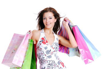 portrait young adult girl with colored bags