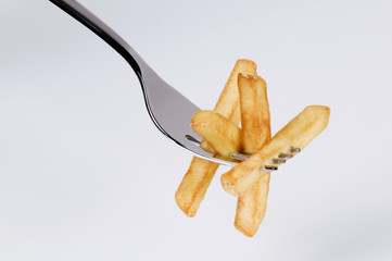 Canvas Print - French fries on a fork